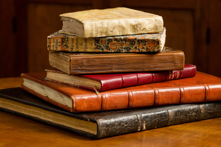 A stack of rare books at the Rare Book and Manuscript Library
