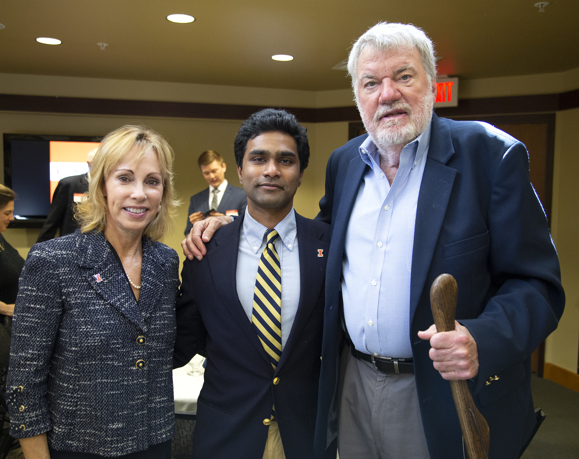 Jane Hays and Dave Downey with a student at the 2019 scholarship luncheon