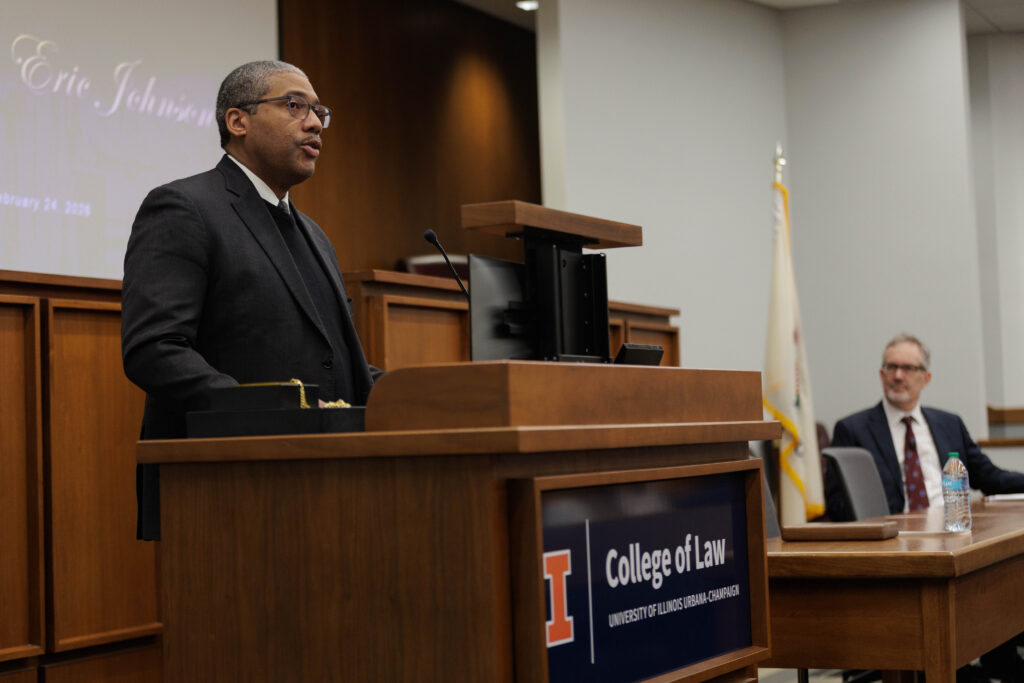 Dean Jamelle Sharpe delivers remarks at the investiture of Professor Eric Johnson
