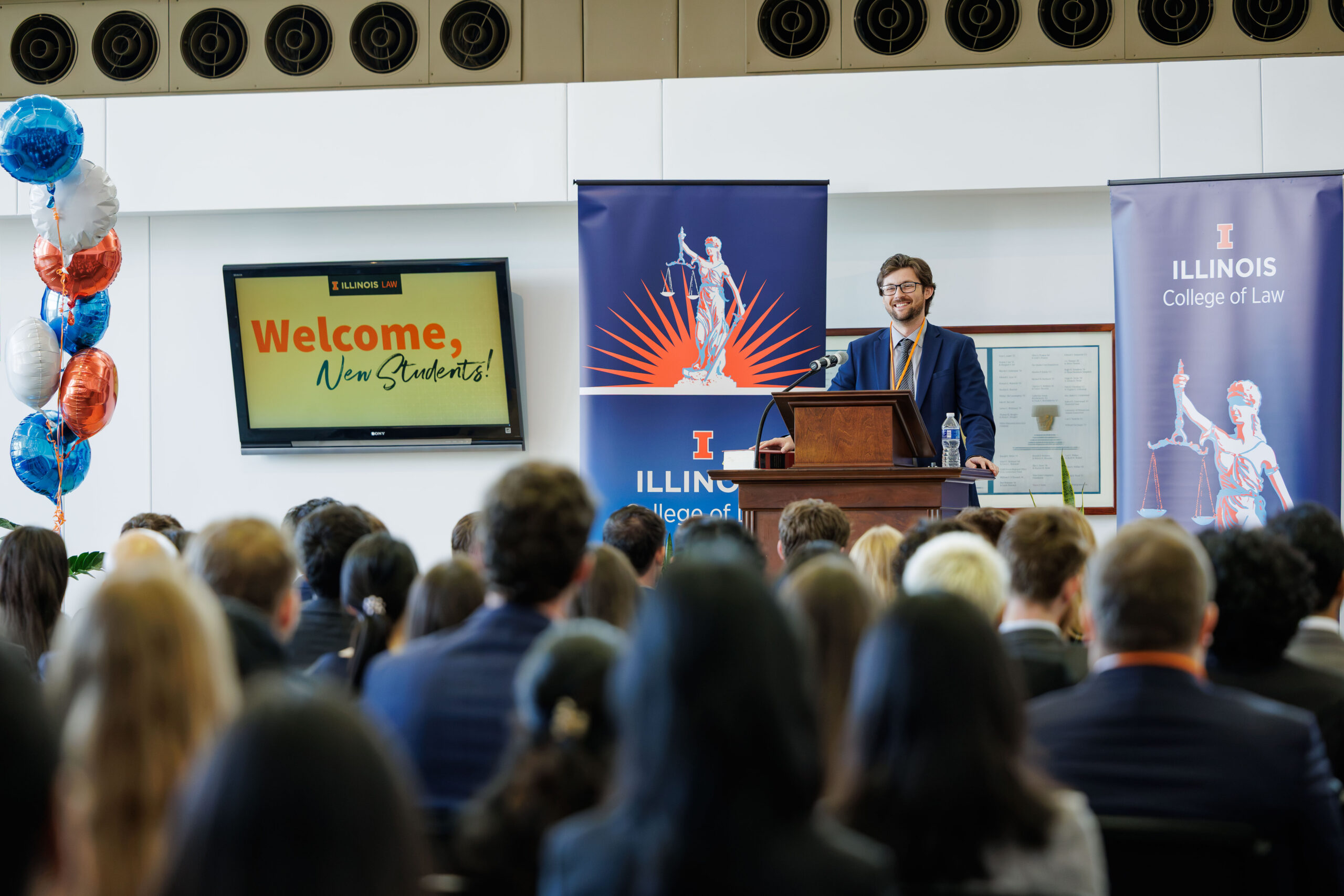 SBA president Logan Thoms welcomes new students during orientation 2026.